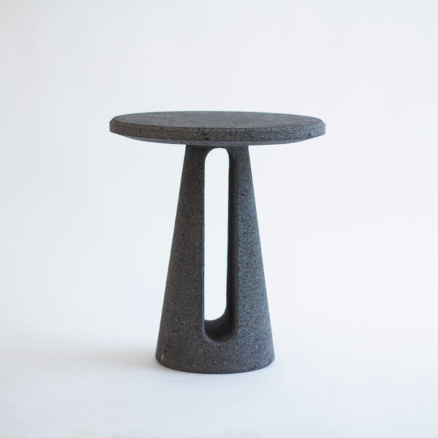 Striata side table made by lava stone, designed by Ricardo Rodriguez Elias.